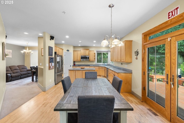 15111 Oyer Dr, Oregon City, OR 97045 - dining space with a chandelier, light wood-style flooring, recessed lighting, and baseboards