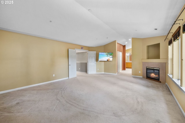 15111 Oyer Dr, Oregon City, OR 97045 - unfurnished living room featuring lofted ceiling, a fireplace with flush hearth, carpet, and baseboards