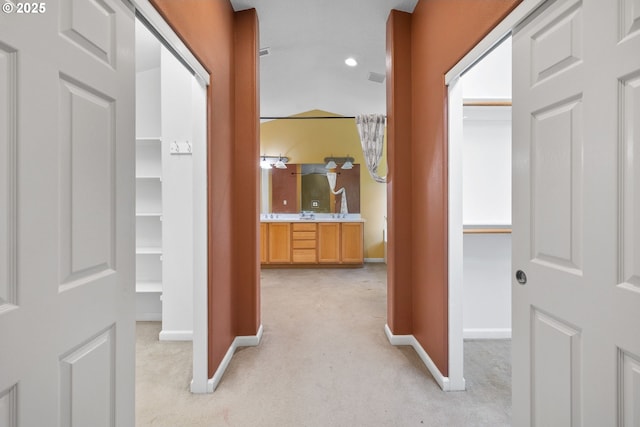 15111 Oyer Dr, Oregon City, OR 97045 - hallway with baseboards, light carpet, and recessed lighting