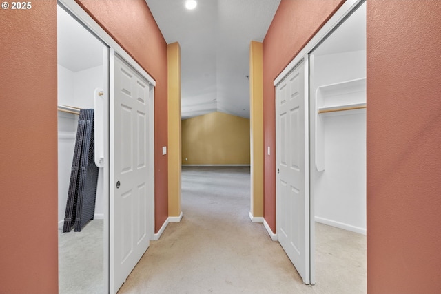 15111 Oyer Dr, Oregon City, OR 97045 - hallway featuring light colored carpet, baseboards, and lofted ceiling