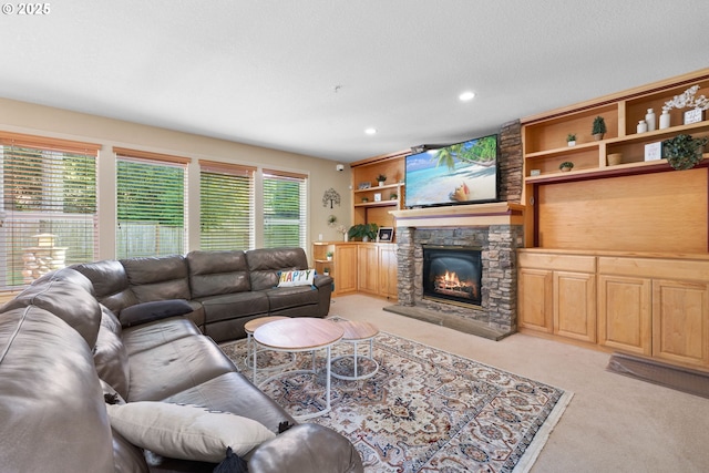 15111 Oyer Dr, Oregon City, OR 97045 - living area with light carpet, a stone fireplace, and recessed lighting