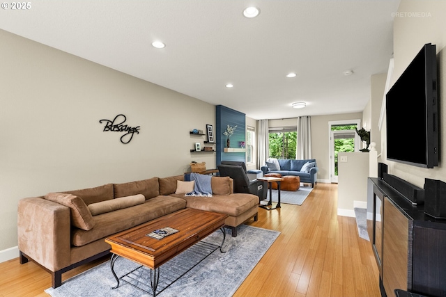 1902 NE 48th Way, Hillsboro, OR 97124 - living area featuring baseboards, recessed lighting, and light wood-style floors