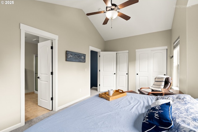 1902 NE 48th Way, Hillsboro, OR 97124 - carpeted bedroom featuring two closets, baseboards, ceiling fan, and high vaulted ceiling