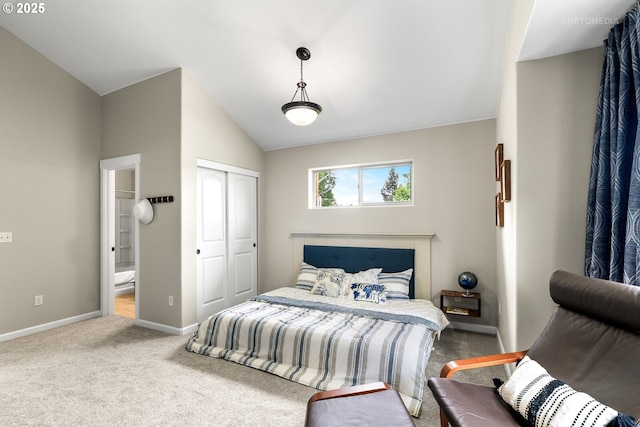1902 NE 48th Way, Hillsboro, OR 97124 - carpeted bedroom with lofted ceiling, baseboards, a closet, and ensuite bath