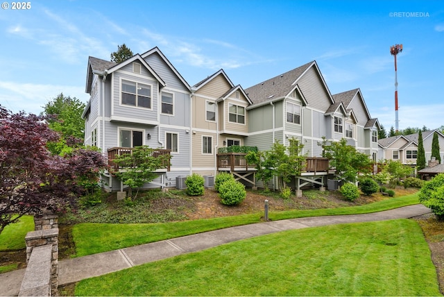 1902 NE 48th Way, Hillsboro, OR 97124 - view of front of property featuring board and batten siding, a front lawn, cooling unit, and a residential view