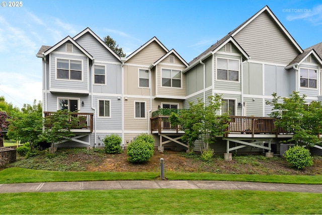 1902 NE 48th Way, Hillsboro, OR 97124 - rear view of house featuring board and batten siding, a yard, and a deck
