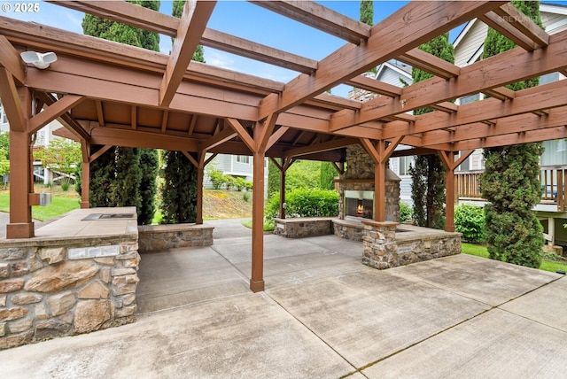 1902 NE 48th Way, Hillsboro, OR 97124 - view of patio with an outdoor stone fireplace