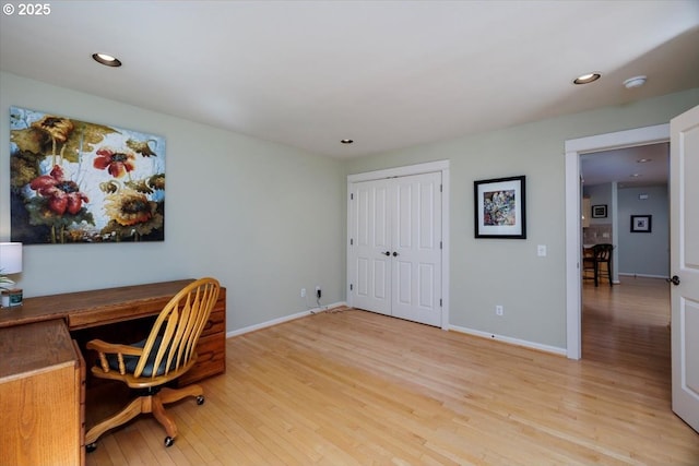 home office with recessed lighting, baseboards, and wood finished floors