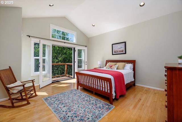 bedroom with high vaulted ceiling, baseboards, wood finished floors, and access to exterior