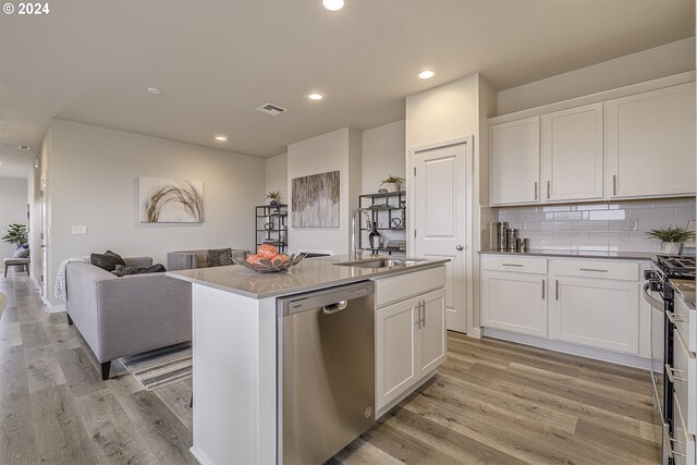 3619 Chestnut St Lot 51, Forest Grove, OR 97116 - kitchen featuring appliances with stainless steel finishes, a sink, light wood-type flooring, white cabinetry, and open floor plan