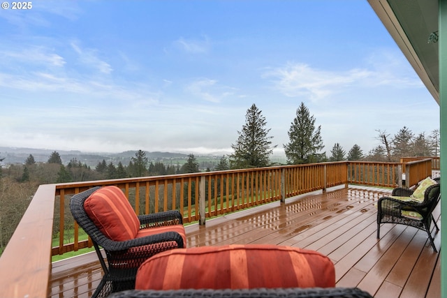 deck featuring a mountain view