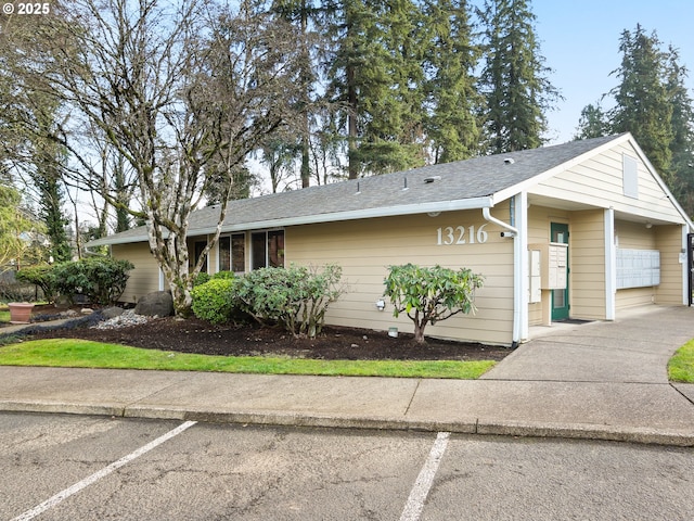 ranch-style home with a garage