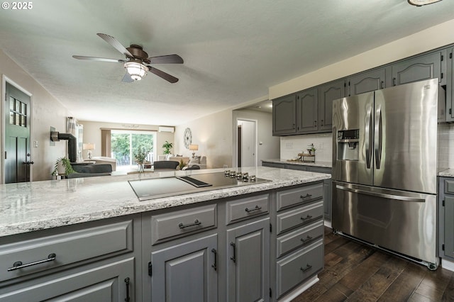 20256 S Swank Rd, Colton, OR 97017 - kitchen with stainless steel refrigerator with ice dispenser, ceiling fan, dark wood-style flooring, black electric cooktop, and gray cabinetry