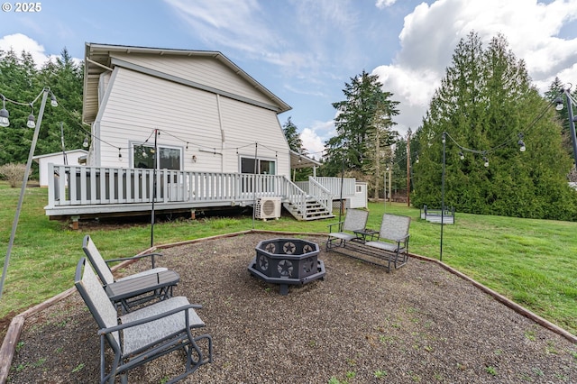20256 S Swank Rd, Colton, OR 97017 - back of house with an outdoor fire pit, a wooden deck, a lawn, and ac unit