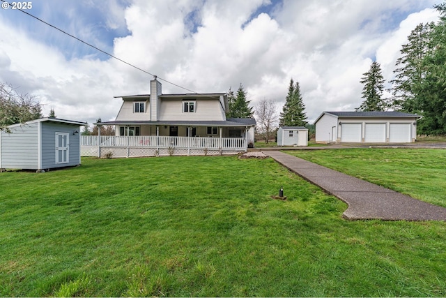 20256 S Swank Rd, Colton, OR 97017 - view of front facade with a garage, a storage unit, a chimney, an outdoor structure, and a porch