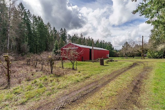 20256 S Swank Rd, Colton, OR 97017 - view of yard featuring an outbuilding, an outdoor structure, and a view of trees