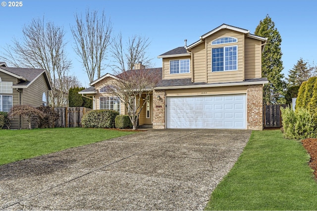 view of front of property with a garage and a front lawn