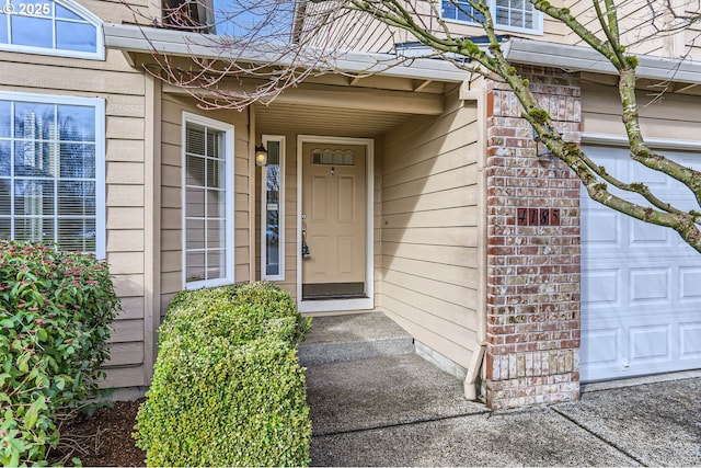 property entrance featuring a garage