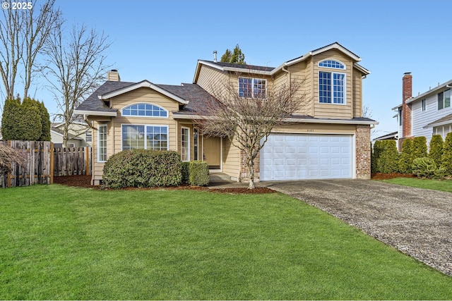 view of front facade featuring a garage and a front lawn