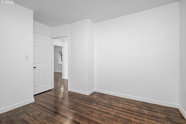 461 Blair Blvd, Eugene, OR 97402 - unfurnished room with baseboards and dark wood finished floors