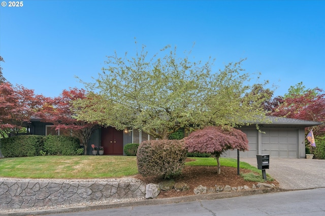 7398 SW Eastmoor Ter, Portland, OR 97225 - view of property hidden behind natural elements featuring a garage, driveway, and a front lawn