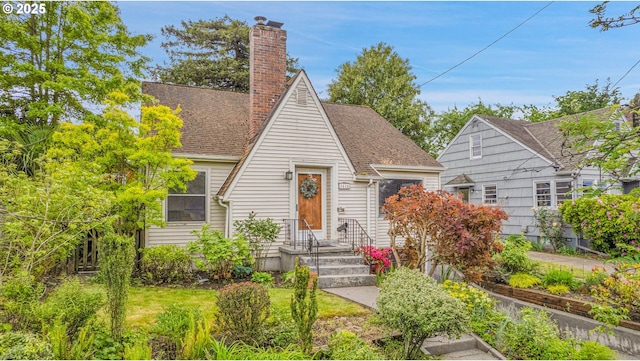 view of front of house featuring a chimney