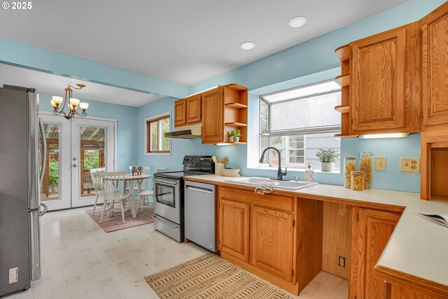 kitchen featuring a sink, stainless steel appliances, open shelves, under cabinet range hood, and light countertops