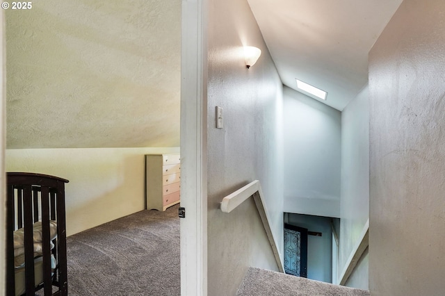 318 Koons St, Silverton, OR 97381 - staircase featuring vaulted ceiling, carpet flooring, and a skylight