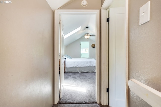 318 Koons St, Silverton, OR 97381 - corridor featuring lofted ceiling, carpet, and a textured wall