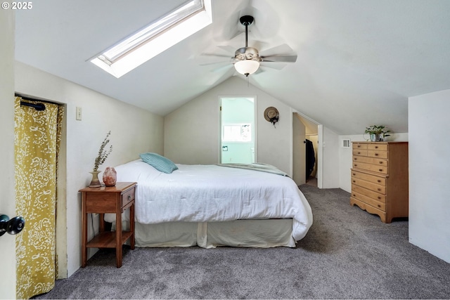 318 Koons St, Silverton, OR 97381 - bedroom featuring carpet floors, lofted ceiling, a skylight, ceiling fan, and a walk in closet