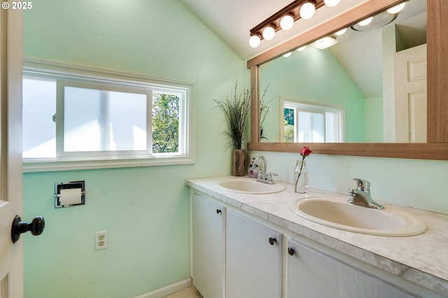 318 Koons St, Silverton, OR 97381 - bathroom featuring lofted ceiling, plenty of natural light, and double vanity