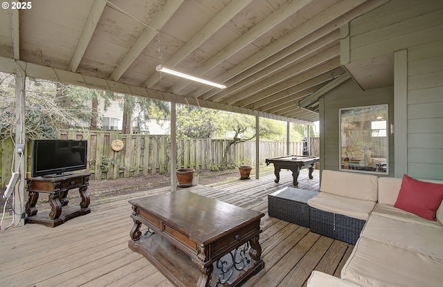 wooden deck featuring a fenced backyard and outdoor lounge area