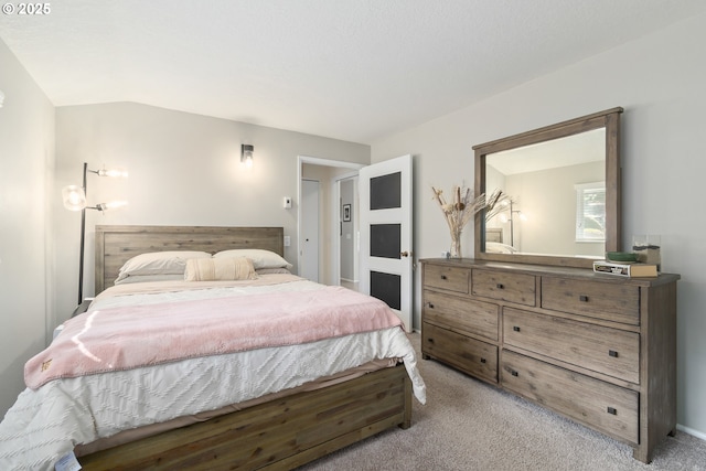 bedroom featuring light colored carpet