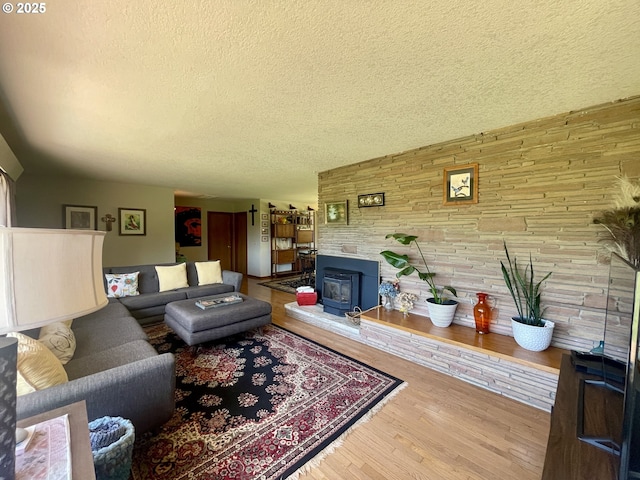 54824 Robinson Rd, Coquille, OR 97423 - living room featuring a textured ceiling and wood finished floors