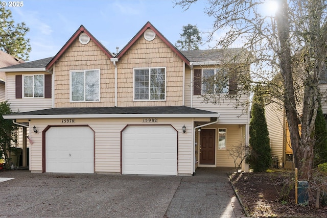 view of front of property with a garage