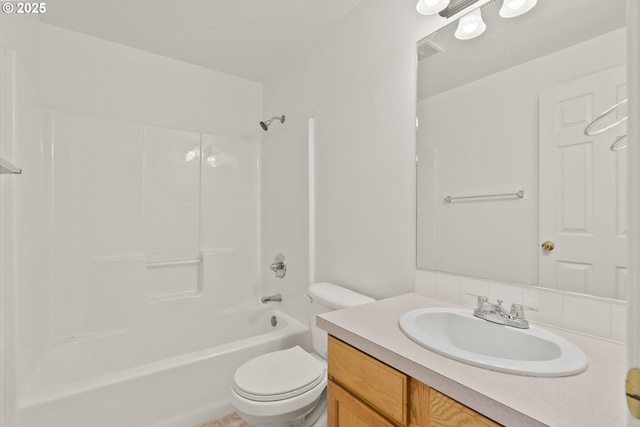 full bathroom with washtub / shower combination, toilet, and vanity