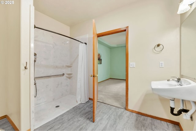 1041 Irving Rd, Eugene, OR 97404 - full bath with wood finished floors and curtained shower