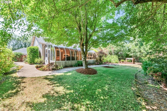 1041 Irving Rd, Eugene, OR 97404 - view of green lawn with a sunroom
