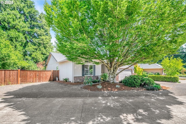 1041 Irving Rd, Eugene, OR 97404 - view of property hidden behind natural elements featuring driveway