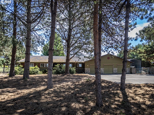 10160 NW Gordon Rd, Cornelius, OR 97113 - single story home with driveway, stone siding, and an attached garage