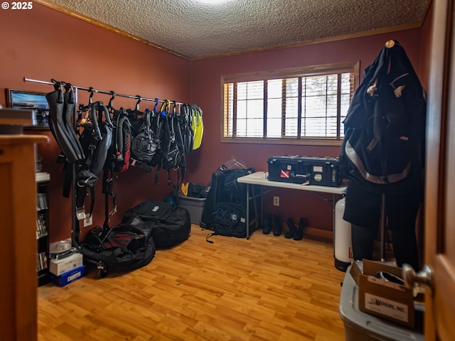 10160 NW Gordon Rd, Cornelius, OR 97113 - misc room featuring wood finished floors, a textured ceiling, and crown molding