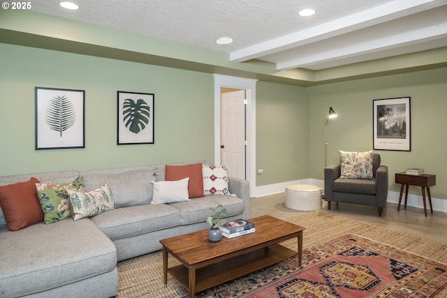 living room featuring recessed lighting, beam ceiling, a textured ceiling, and baseboards