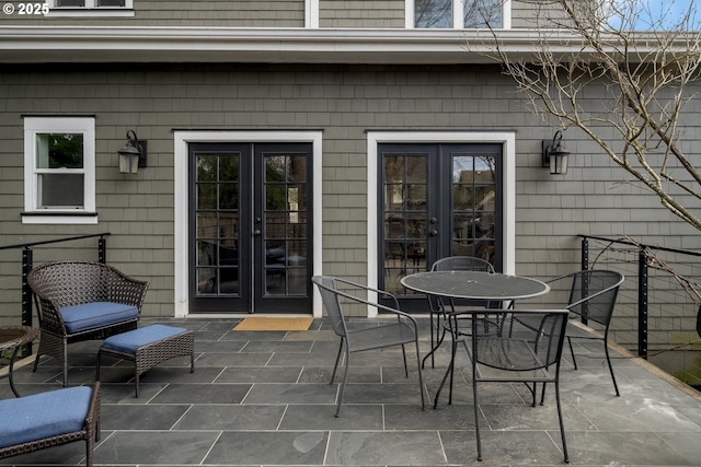 view of patio / terrace featuring french doors and outdoor dining space