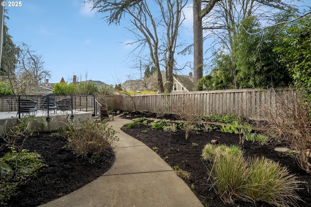 view of yard featuring a fenced backyard