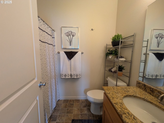 3159 SW Jaden Dr, Beaverton, OR 97003 - bathroom with toilet, vanity, and baseboards