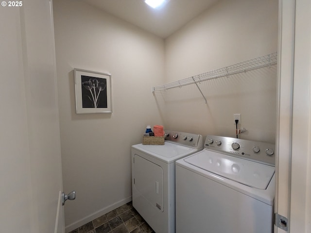3159 SW Jaden Dr, Beaverton, OR 97003 - clothes washing area with separate washer and dryer, baseboards, and dark stone finish floors