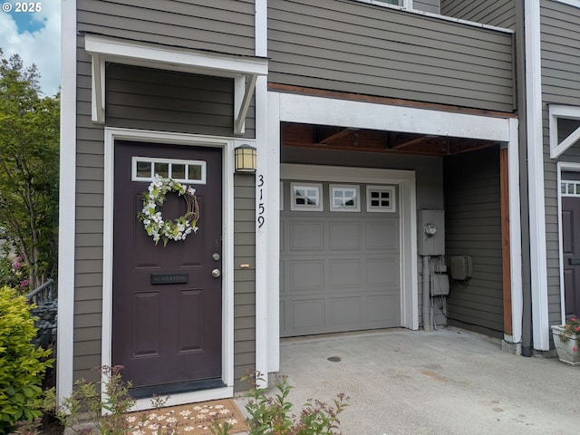 3159 SW Jaden Dr, Beaverton, OR 97003 - doorway to property with asphalt driveway and an attached garage