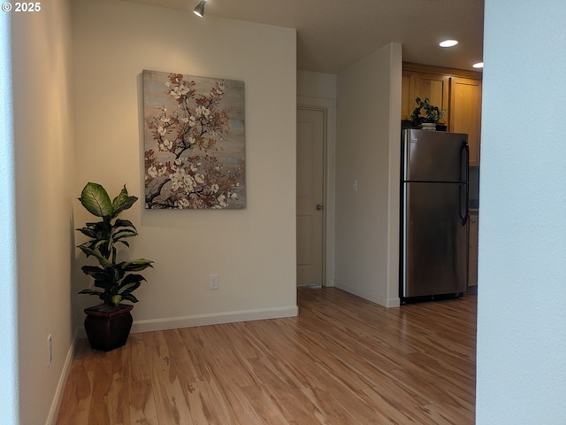 3159 SW Jaden Dr, Beaverton, OR 97003 - kitchen featuring freestanding refrigerator, light wood-type flooring, recessed lighting, and baseboards