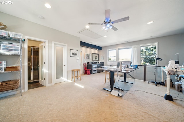 carpeted office space featuring recessed lighting, ceiling fan, and baseboards