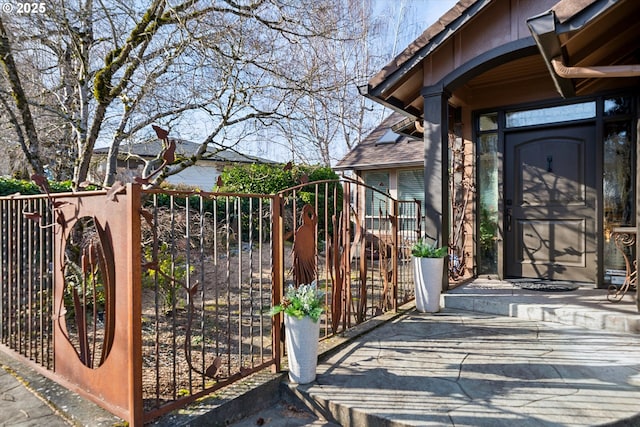 view of gate featuring fence